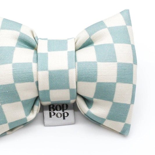 Aqua Blue checkerboard puffy bow tie made of 100% Organic Cotton Linen close up image of canvas texure on white background