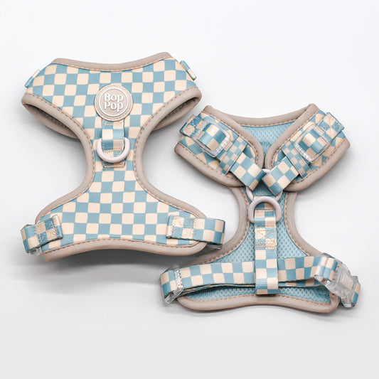 Best dog harness design for Small or large dogs cats. Most Comfortable, Soft Padded Dog Harness. Fits all sizes XS, small, medium, large dogs cats. Bop Pop Pets dog pet accessories pet supplies. Bohemian style. comfort soft dog harness checkerboard print in slate blue. Front d-ring harness for stylish modern dogs Bop Pop Pet dog accessories Boho style. Close of front d-ring detail
Blue checkerboard print dog accessory