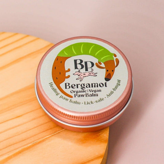 Bergamot Palm and hand balm for dogs and humans. Healing balm with lick-safe and food grade essential oils , shea butter, vitamin e, and coconut oil. Anti-anxiety, non-toxic, vegan and organic ingredients for pet grooming