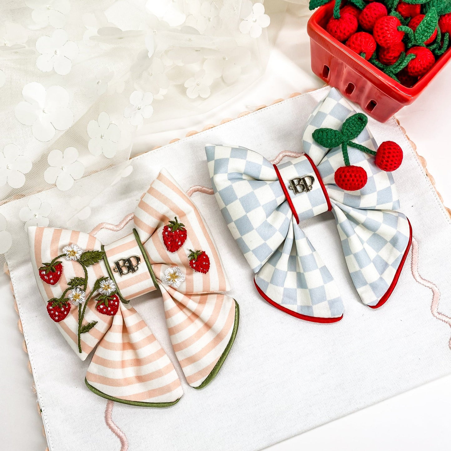 strawberry shortcake dog collar bow tie and sailor bow for pets dog or cat. Strawberry embroidery patch with organic cotton pink striped fabric. Dog mom girl dog style. Green olive satin trim on elevated pet bows and elevated pet accessories bop pop pets cherry theme fruit theme dog bows accessory