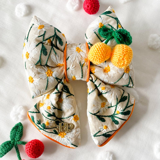 dog collar bow tie and sailor bow for pets dog or cat. flower daisy floral embroidery fabric with lemon 3D crochet embellishment. Dog mom girl dog style. Green olive satin trim on elevated pet bows and elevated pet accessories bop pop pets fruit theme dog bows accessory