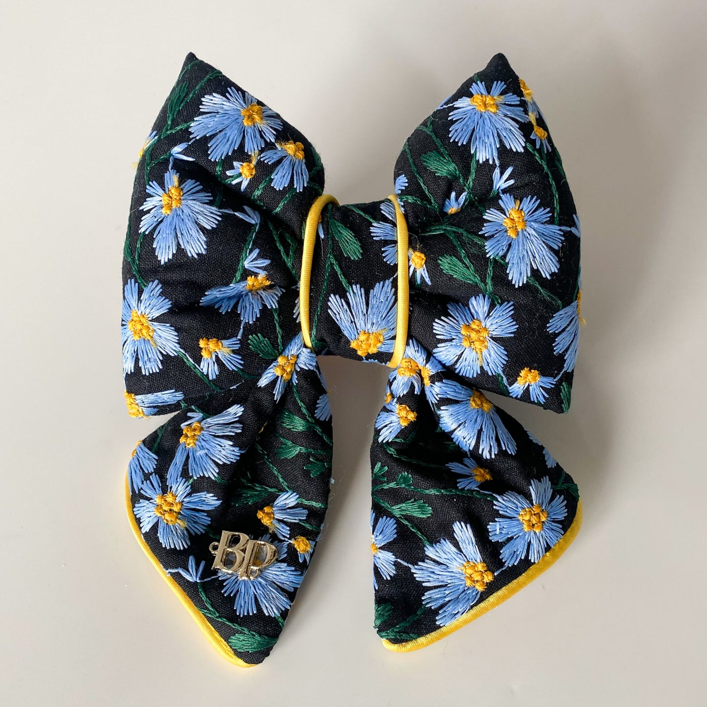 dog collar bow tie and sailor bow for pets dog or cat. flower daisy floral embroidery fabric embellishment. Dog mom girl dog style. Green olive satin trim on elevated pet bows and elevated pet accessories bop pop pets fruit theme dog bows accessory