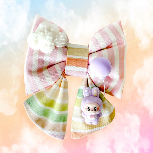 Colorful raibow with labubu style with cloud sailor bow tie for pets dog cats. Balloon in the Clouds in pink stripes and rainbow sunset color. Cotton puffy bow with sherpa