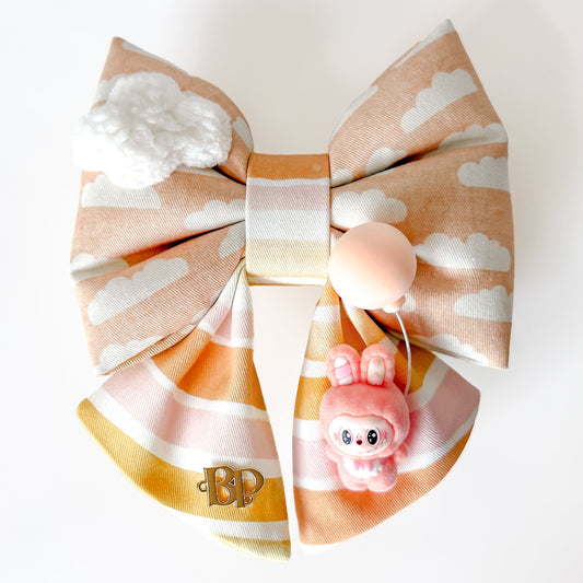 labubu style with cloud sailor bow tie for pets dog cats. Balloon in the Clouds in peach rainbow sunset color. Cotton puffy bow with sherpa