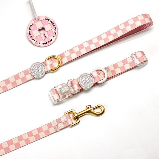 Pink checkered print dog collar, leash, and poop loop for dog walking - pet accessories set Bop pop pets