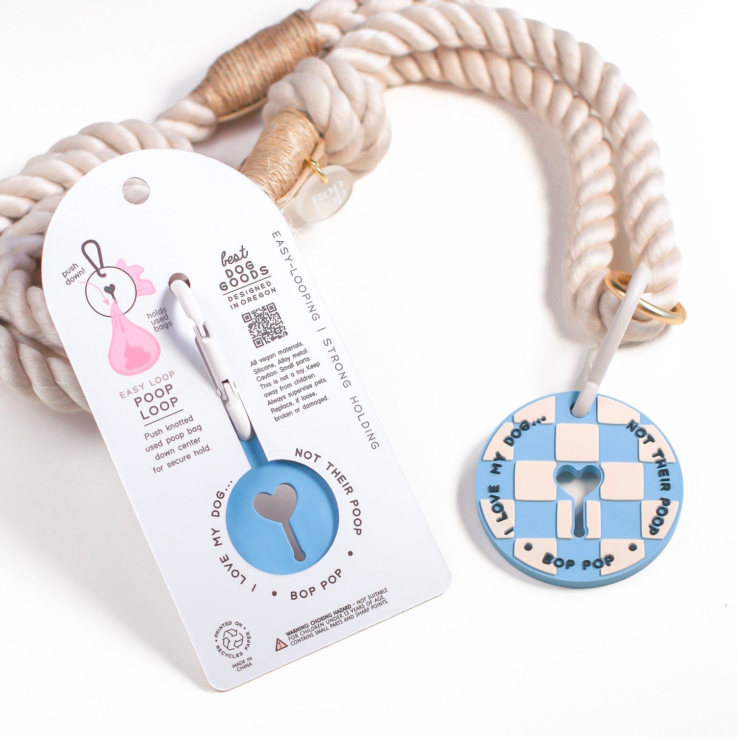 Dog leash with checkered poop loop with carabiner design on a white background