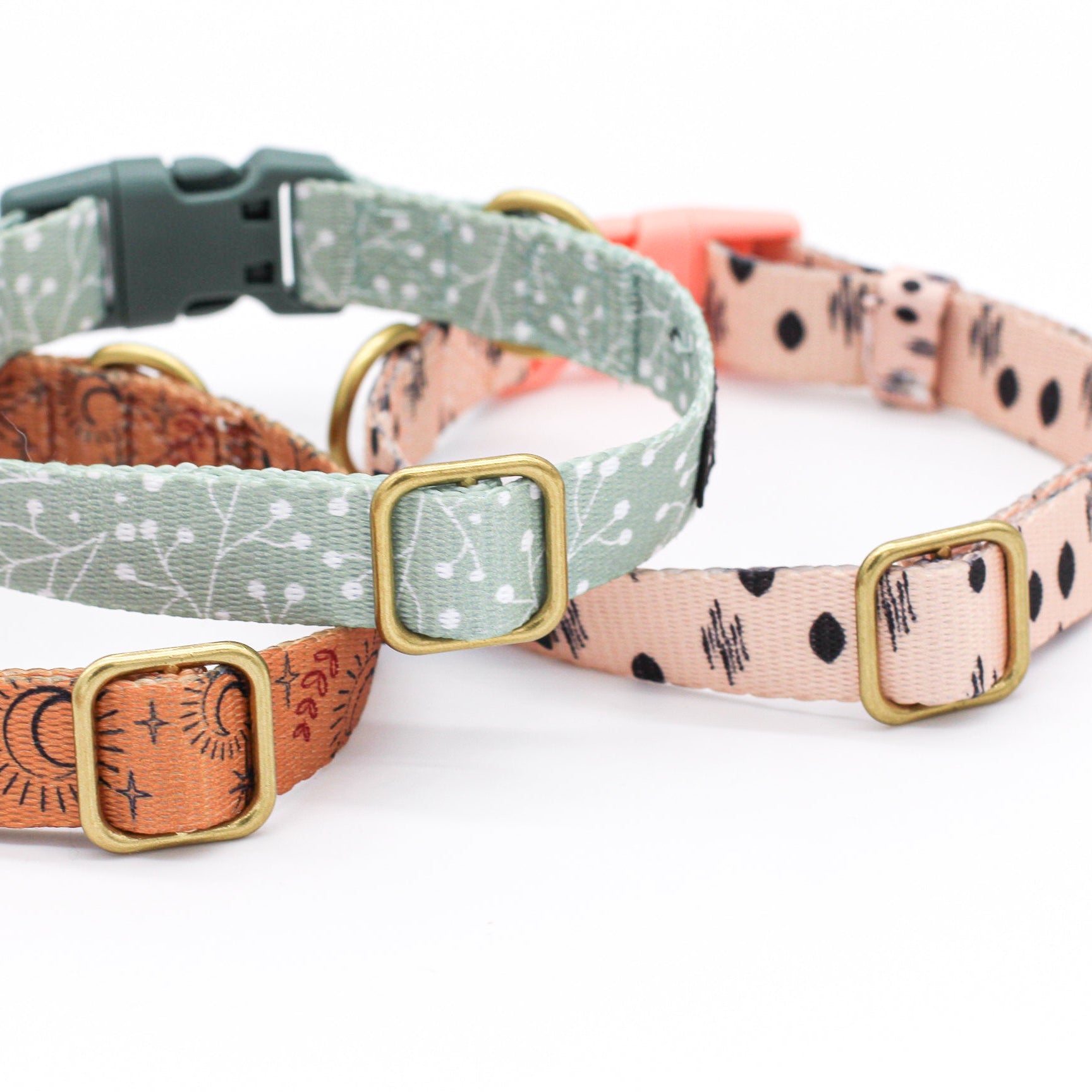 Bop Pop dog collar collection with different patterns on a white 