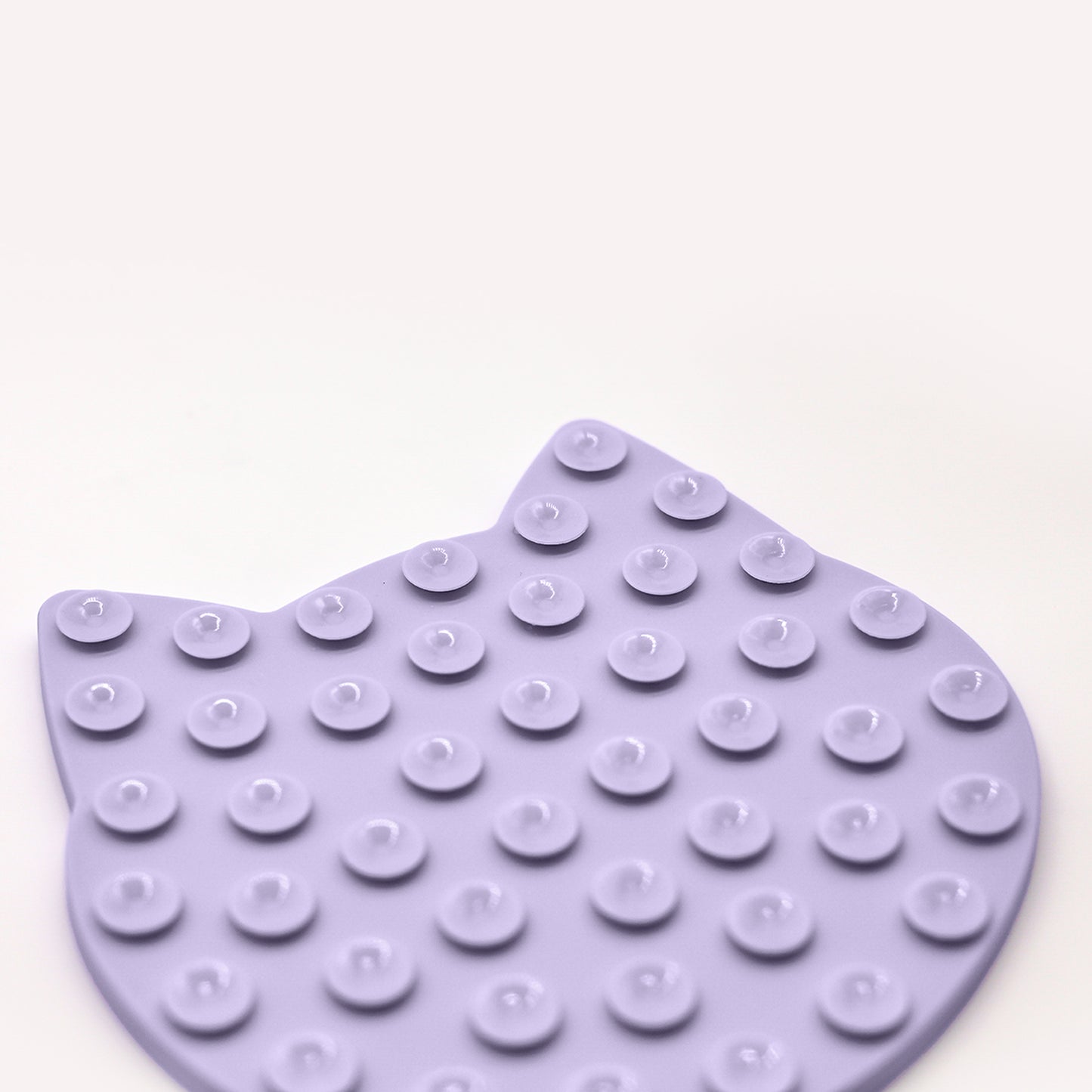 Happy Cat Kitty Lick mat backside view of multiple small circle suction cups on white background