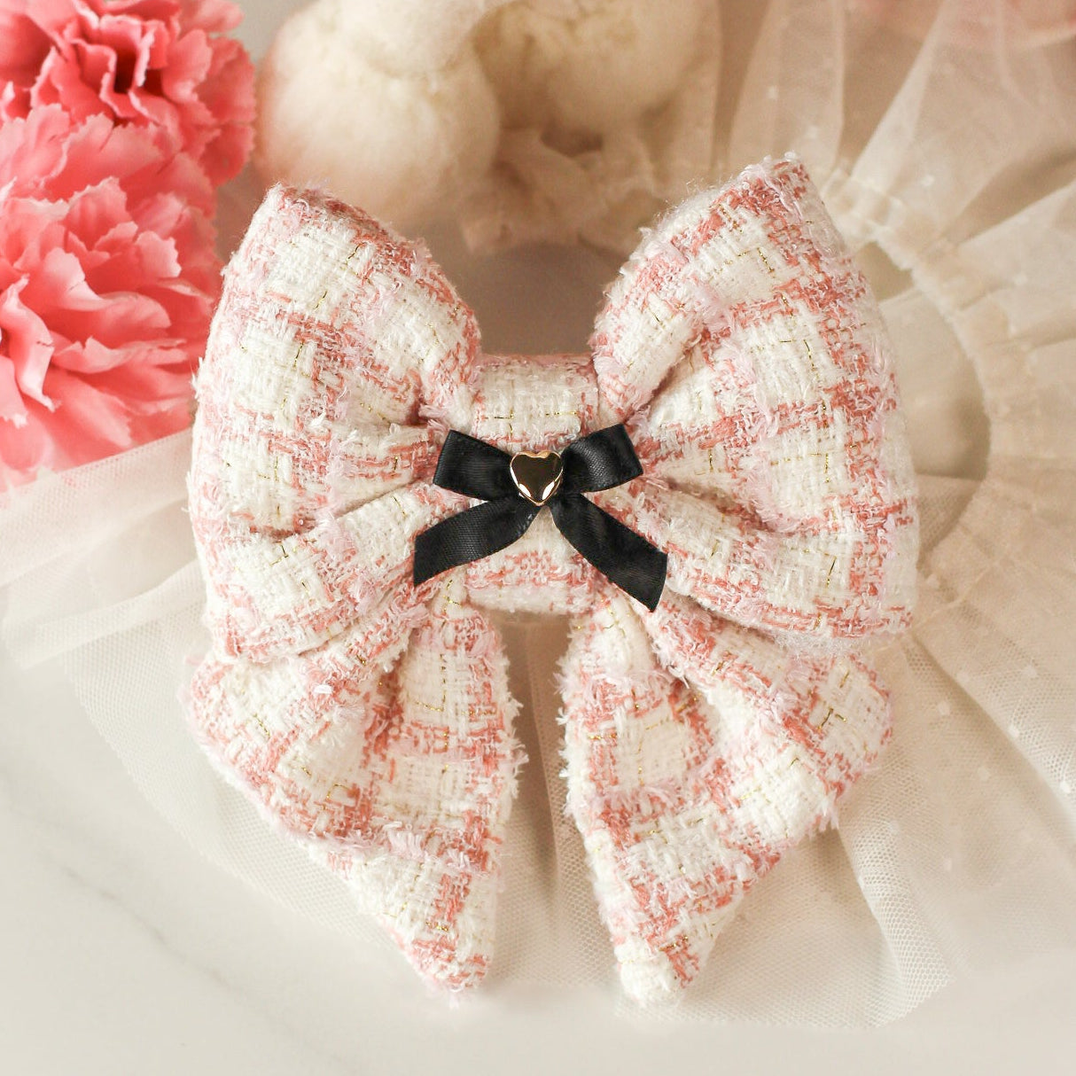 White pink lattice plaid soft tweed chenille sailor bow and decorative flowers on a pink background. Bop Pop Pets pet bow accessory.
