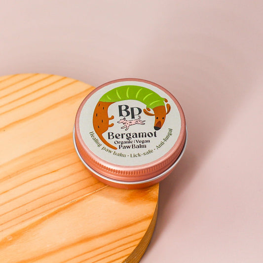 Bergamot Palm and hand balm for dogs and humans. Healing balm with lick-safe and food grade essential oils , shea butter, vitamin e, and coconut oil. Anti-anxiety, non-toxic, vegan and organic ingredients for pet grooming