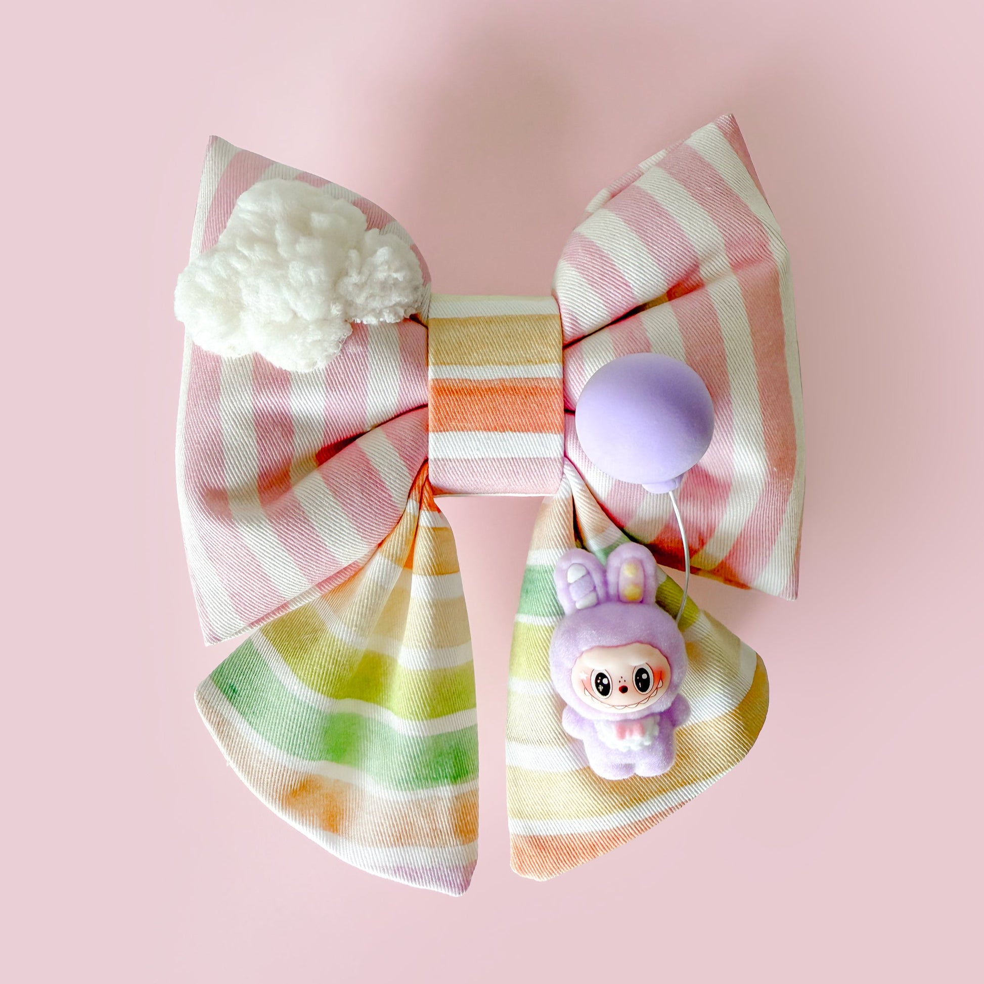 Colorful raibow with  labubu style with cloud sailor bow tie for pets dog cats. Balloon in the Clouds in pink stripes and rainbow sunset color. Cotton puffy bow with sherpa