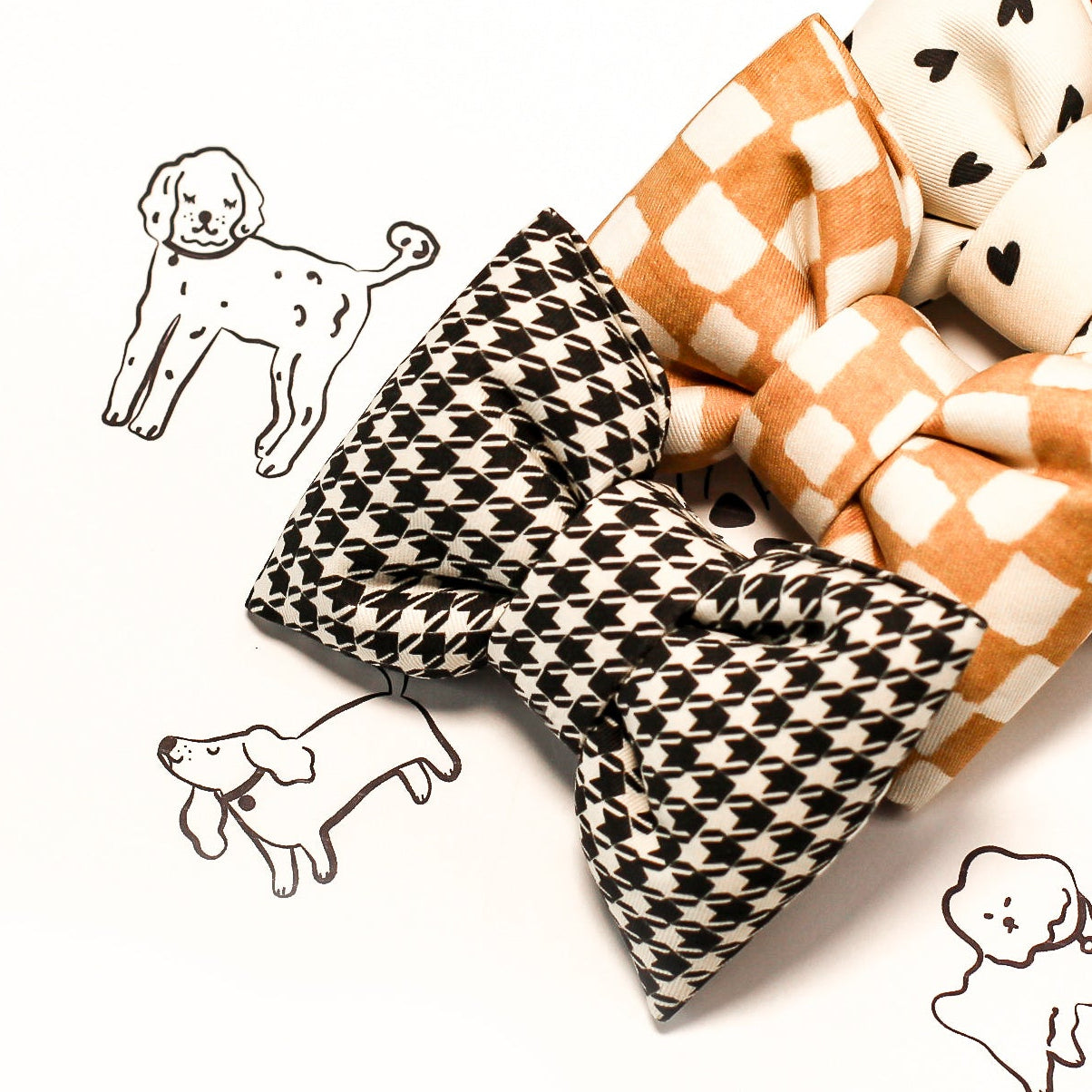 Houndstooth dog bow tie with various patterns with checkerboard and hearts on a white background with small dog illustrations. Bop Pop Pets pet accessories.