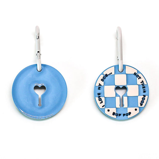 Poop Loop in blue checkered  with heart design key hole opening for used dog waste bags and dog walks by Bop Pop Pets
