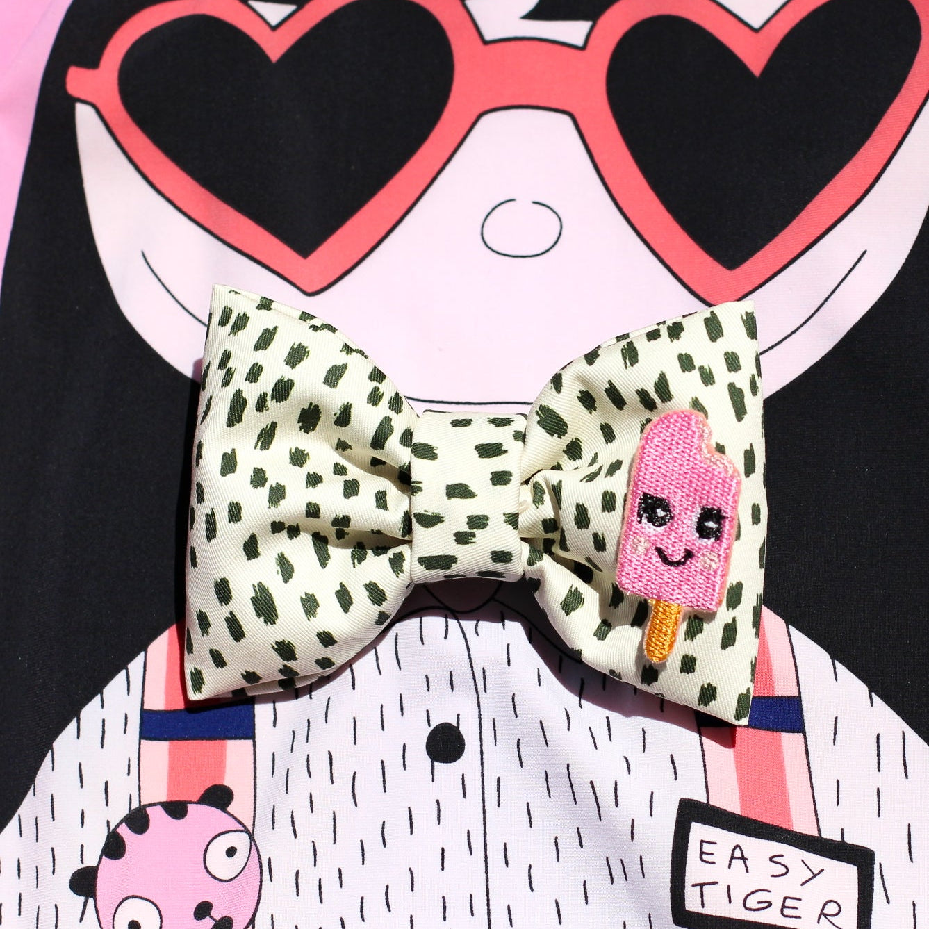black white dotted bow tie for pets dogs and cats with pink popsicle patch with smiley face. Bop Pop Pets trendy modern fashion bows for pets. 100% Cotton
