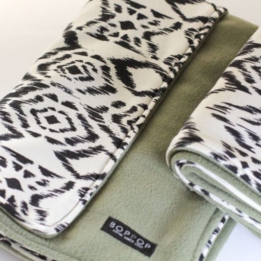 Mini Pet Blanket for pets with green jade  Fleece fabric with reverse side fabric in  ikat black and white print with coordinating black brand label